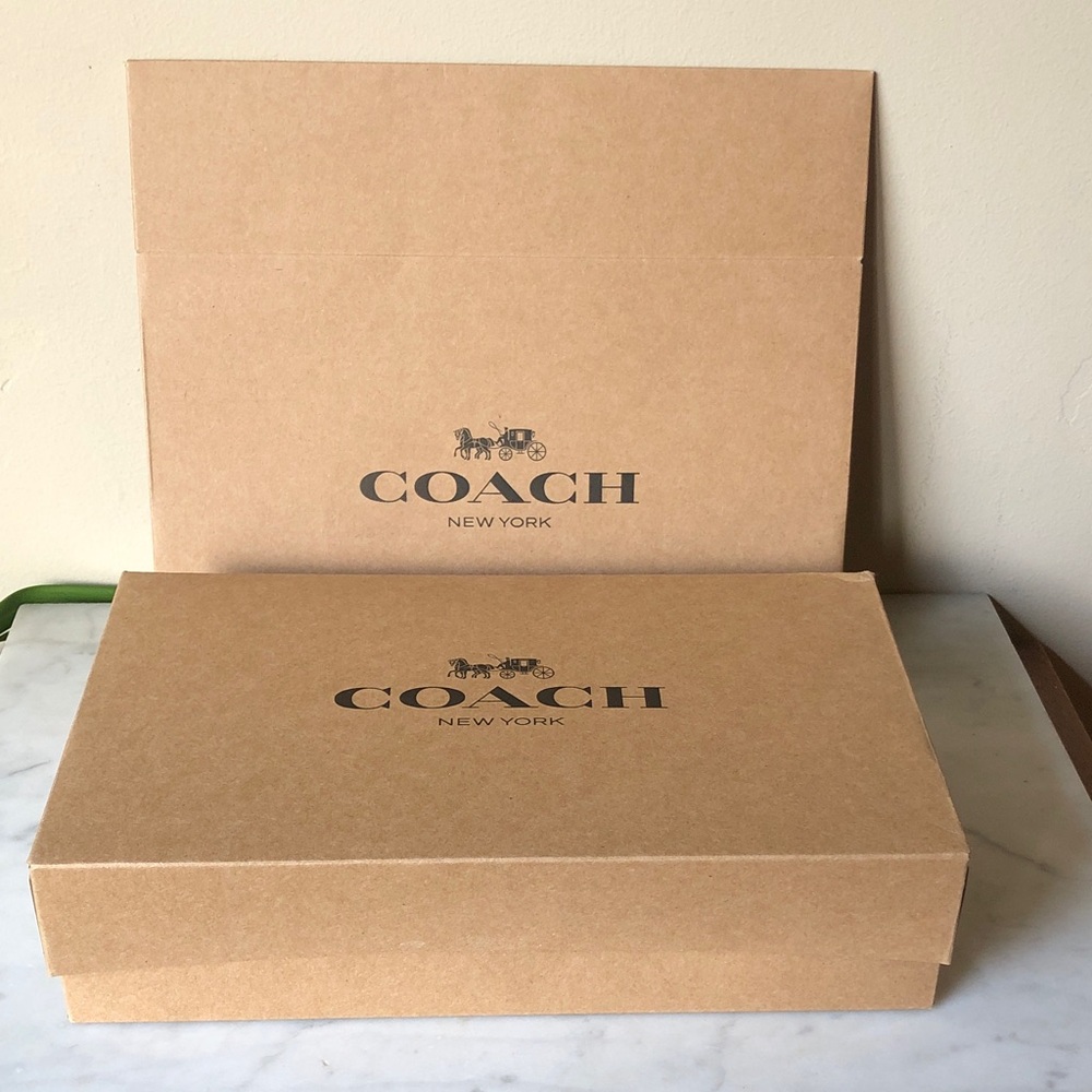 Coach gift boxes.  Two gift boxes.  They fold flat for easy storage.